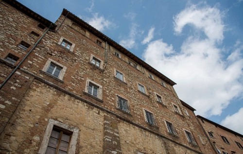 Medieval historical architecture buildings, Montepulciano, city Tuscany, Italy against blue sky