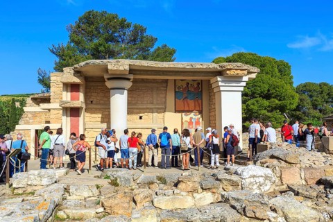 Knossos, Greece, April 27, 2019: People visiting Crete landmark, ruins of Minoan Palace, Europe