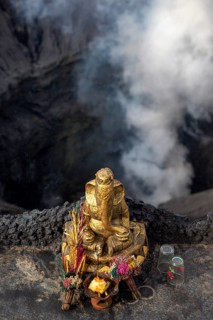 Hindu sacrificial altar with Ganesha the elephant made of gold on a volcanic crater