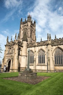 Exterior view of the famous medieval building of the cathedral of the city of Manchester in United