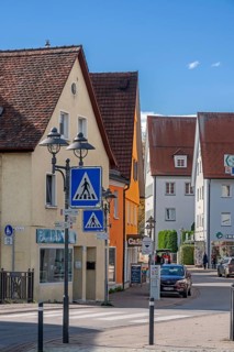 Pointed gable houses and street lamps in Marktstraße, Bad Wurzach, Allgäu, Baden-Württemberg,
