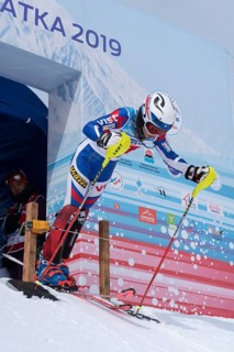 Sportswoman starter mountain skier at start line slalom, Alpine Skiing Cup at Russian Alpine Skiing