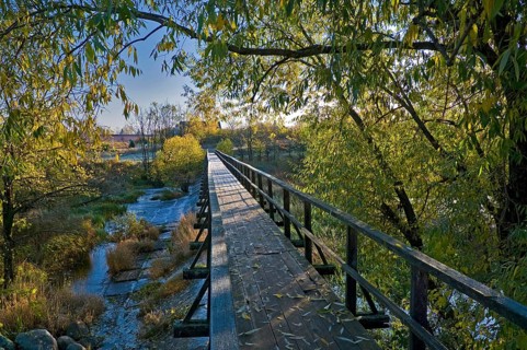 Pedestrian bridge in Suzdal, Russia. Cold and sunny autumn morning