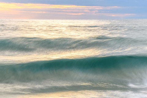 Wave crashing on a sandy beach of the Atlantic Ocean. Sables d'Olonne, Vendee, Pays-de-la-Loire,
