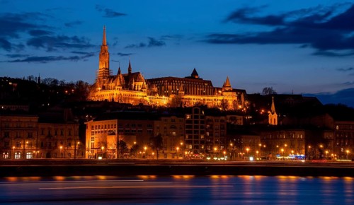 Royal Palace or the Buda Castle after sunset with lights illuminated at in danube river in Budapest