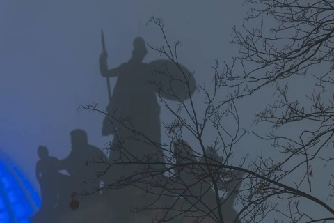 The old town of Dresden shrouded in November fog. Octagon dome with Fama and pediment figures of