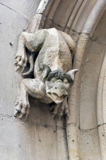 Gargoyles on the wall of a medieval building. Rouen, France, Europe