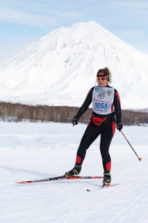PETROPAVLOVSK CITY, KAMCHATKA PENINSULA, RUSSIA, FEB 10, 2018: Sportswoman skier running along the