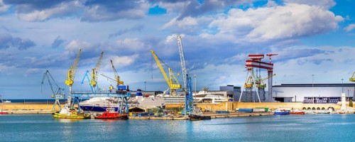 Ancona, Italy, the port with cranes and ships loaded, banner, Europe