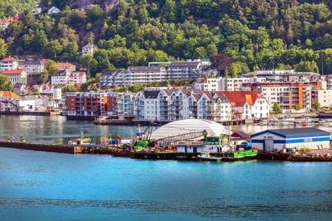 Bergen, Norway, July 30, 2018: City view from the sea with Bryggen harbor, port and colorful
