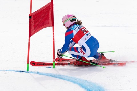 KAMCHATKA PENINSULA, RUSSIA, APR 2, 2019: Mountain skier Girina Vitalina Moscow Region skiing down