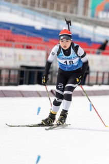 Korean biathlete sportswoman Choi Yoonah Korea skiing on distance biathlon complex during Open