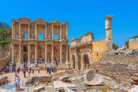 Kusadasi, Turkey, April 28, 2019: People visiting Celsus Library and old ruins of Ephesus or Efes