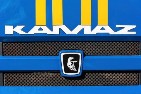 KAMCHATKA, RUSSIA, OCT 2, 2018: Badge and logotype of truck KAMAZ and sticker orange-blue stripes