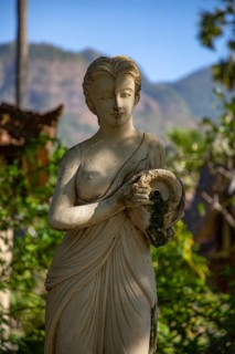 Beauty of the white woman with jug as sensual water bearer