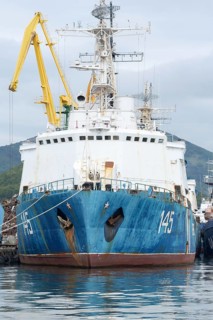 Russian warship Coast Guard of Border Guard Service of Russian FSB anchored at pier in seaport of