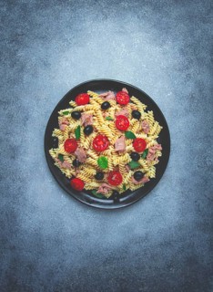 Tuna salad, fusilli pasta, olives and cherry, olive oil, homemade