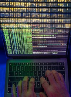 Symbolic image hacker, cyber attack on public buildings, administrations, institutions, town hall,