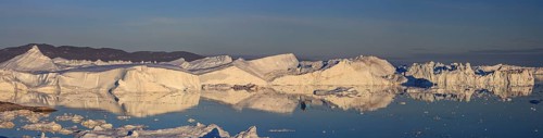 Icebergs and ice floes reflected in the water, sunny, summer, midnight sun, panorama, Jakobshavn