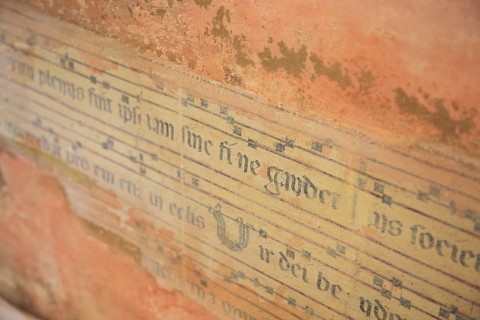 Fragment of music, fresco, of a Franciscan hymn, Assisi, Umbria, Italy, Europe