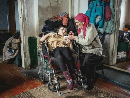 Mischa (17) suffers from spastic paralysis. Grandmother Irina cares for the child and looks after