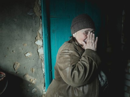 Grandmother Larisa had to flee her home village near Kupiansk. She cares for her traumatised