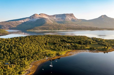 Aerial view over the fjord Efjord south of Narvik, seen at sunset, leisure boats anchor, holiday