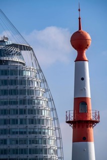 Skyline of Bremerhaven, Atlantic Sail City Hotel skyscraper, front light Bremerhaven, a red and