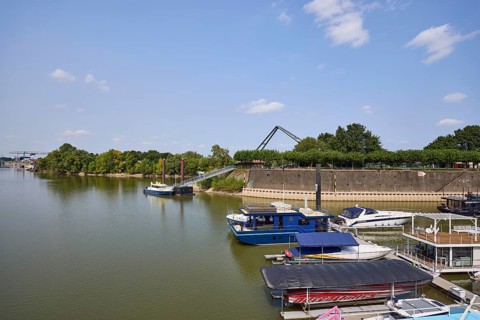 Marina Düsseldorf with bridge at the media harbour and police boat in Düsseldorf, state capital,