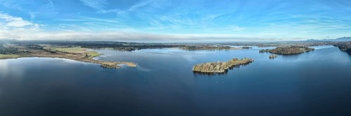 Panorama aerial view of lake Staffelsee near Murnau, Murnaue Moss to islands Wörth, Kleine Birke,