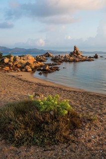Lonely beach with granite rocks, sunrise, Spiaggia Poltu Manzu, Capo Ceraso, near Olbia, Sardinia,