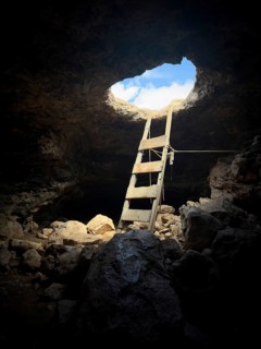 La Cova Foradada cave at the Far de Cap de Barbaria lighthouse on the southern tip of Formentera,