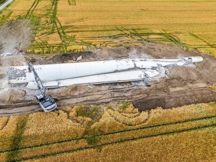 Demolished tower of a 20 year old wind turbine, in the Werl wind farm, 5 old Enercon E-66 turbines