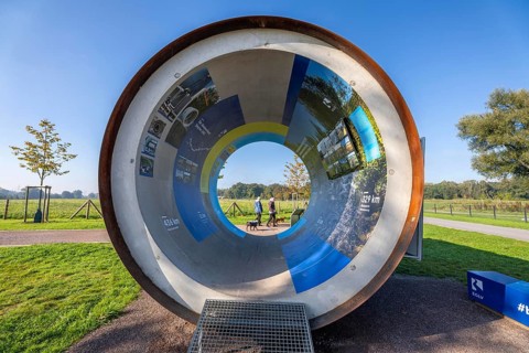 Original sewer pipe element of the Emscher sewer as an information stand in Emscherland, a new