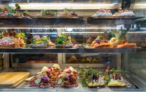 Torvehallerne market halls with market stalls, all kinds of food, restaurants, snack bars,
