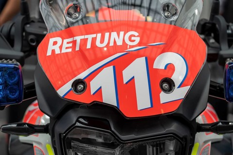Rescue service, motorbike vehicle, inscription emergency number 112