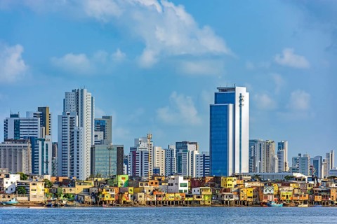 Skyscrapers in the city of Recife in Pernambuco behind the favela on the banks of the Capibaribe