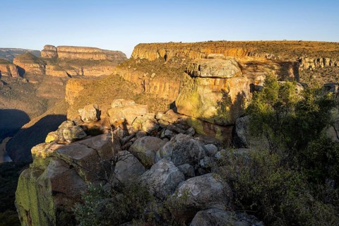Sunset at the Blyde River Canyon, view of the canyon and Mesa Mountains in the evening light, Upper
