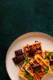 Viennese waffles, with chocolate, breakfast, on a dark background, no people, selective focus,