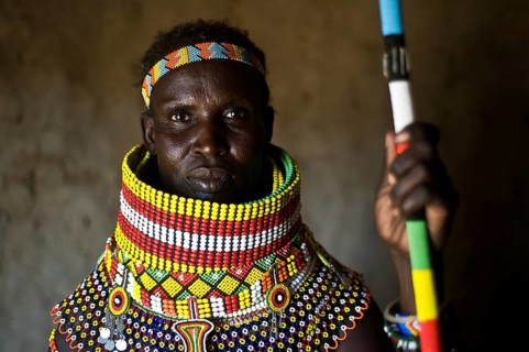 Portrait of a woman from the Turkana tribe, Kenya. She is adorned with traditional beadwork