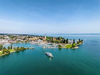 Harbour area, ferry port, yacht harbour, marina of Romanshorn with Seepark, and the departing