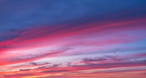 Red glowing clouds in the evening light at sunset, sunset, panorama, wallpaper, sky replacement