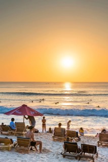 Surfers and bathers, beach, holiday, sunset, travel, beach holiday, tourism, evening sun, evening