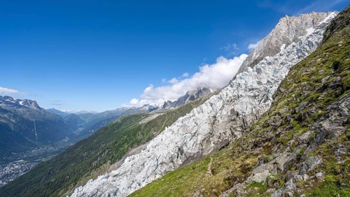 Mountain landscape with glacier Glacier des Bossons and summit of the Aiguille du Midi, Chamonix,