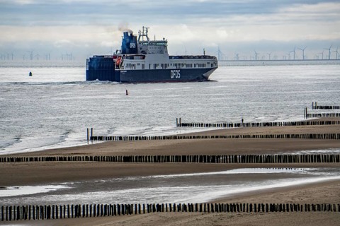 The DFDS cargo ferry Begonia Seaways, loaded with lorry trailer and new cars, leaves the