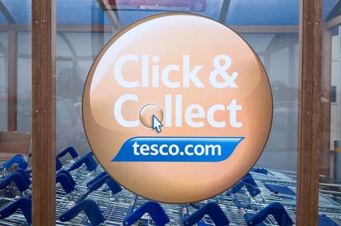 Click and Collect Tesco sign close up, UK