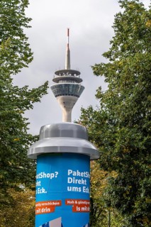 Advertising pillar with 5G mobile phone antenna in the roof of the advertising pillar, over 50 of
