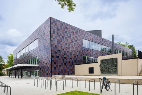 Göttingen City Hall, also known as the tiled stove. Relief The City by Jürgen Weber (1928-2007),