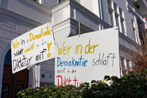 Banner, Those who sleep in democracy wake up in dictatorship, demonstration against right-wing