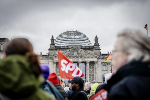 SPD flag in front of the Reichstag building. Taken at the large demonstration against the right in
